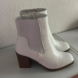 super fun and cute booties, never worn! great condition. great for all outings.